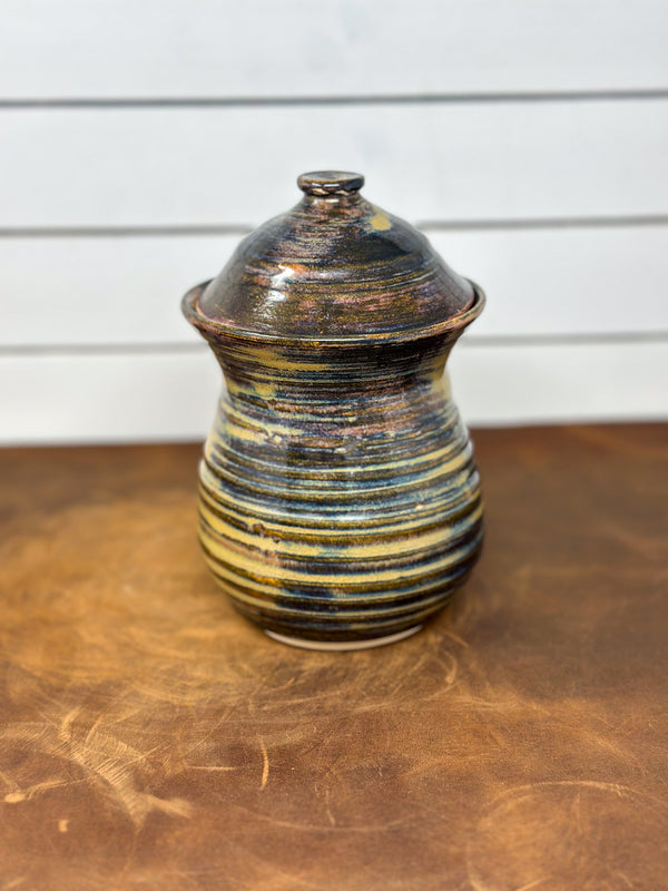Brown and Golden Yellow Lidded Pottery Jar